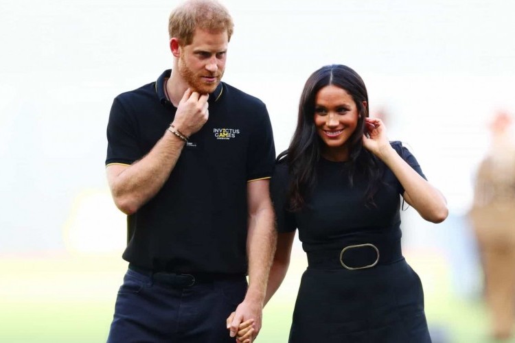 https://radiometropoleam.com.br/uploads/news/Harry e Meghan Markle faturaram uma fortuna em 1.º evento público